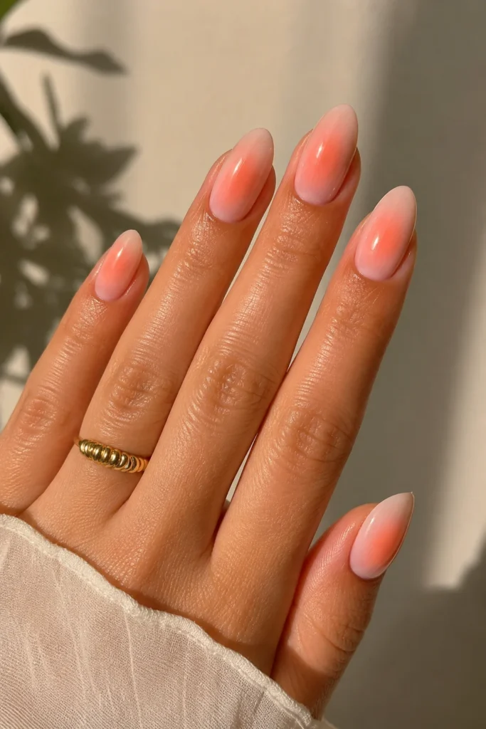 Peach aura nails soft glowing gradient finish summer