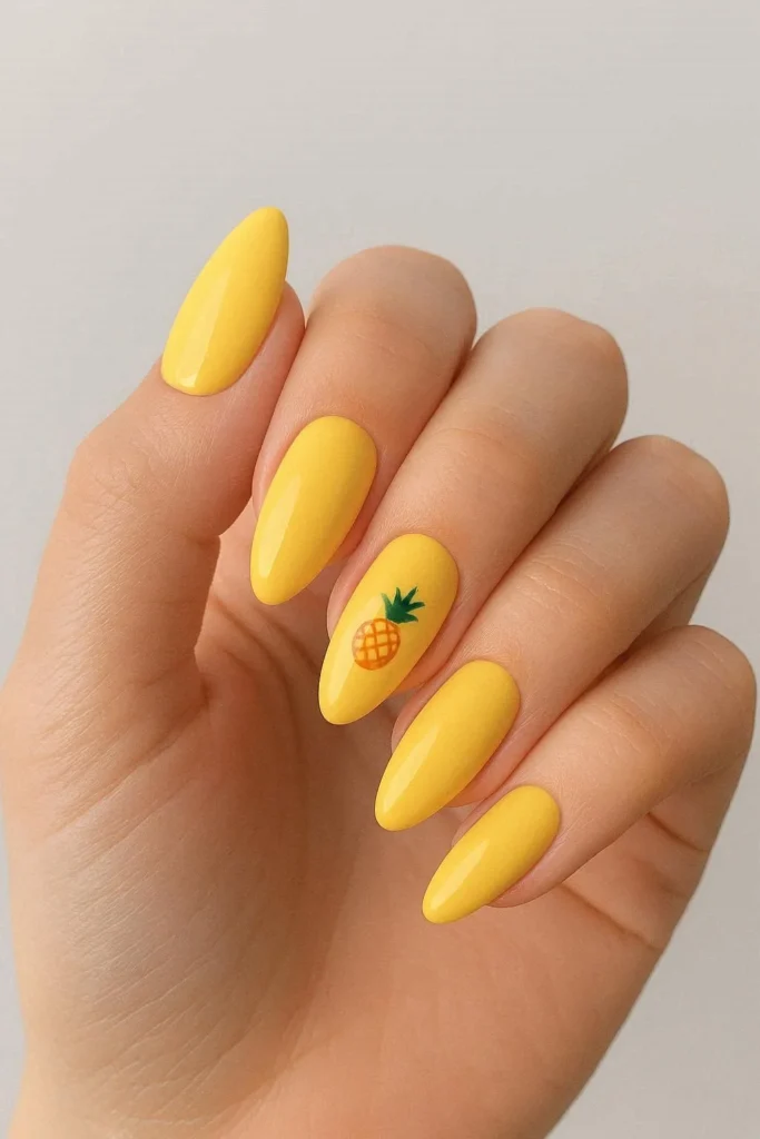 Pineapple accent almond nails with cute fruit details on bright base
