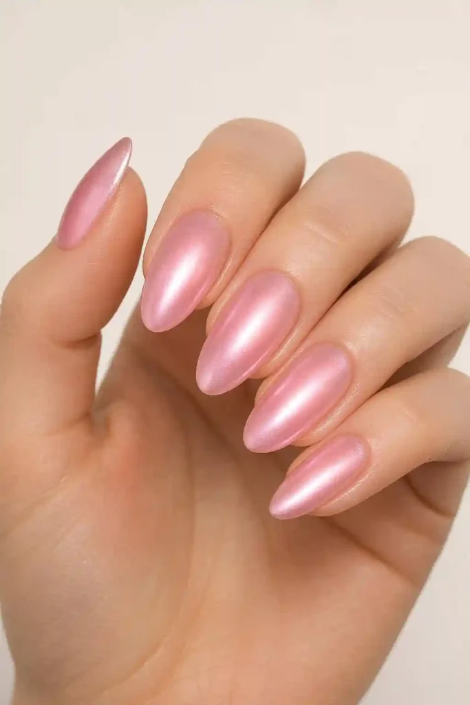 Pink chrome aura nails with soft gradient metallic finish