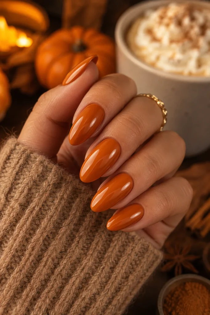 Glossy pumpkin spice almond nails for Thanksgiving fall manicure