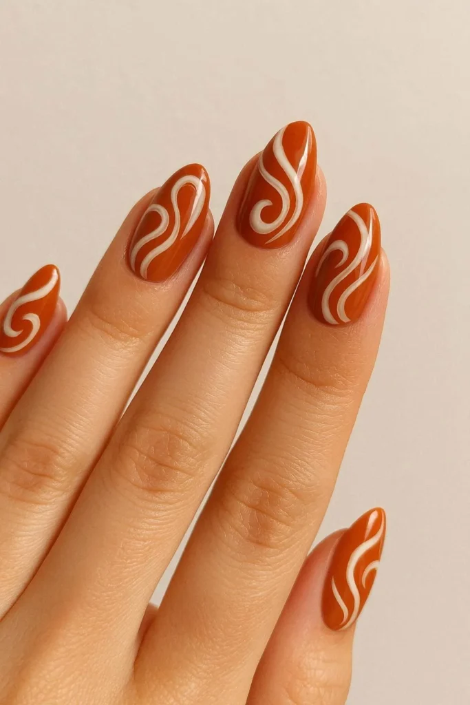 Pumpkin spice swirl nail art design for October