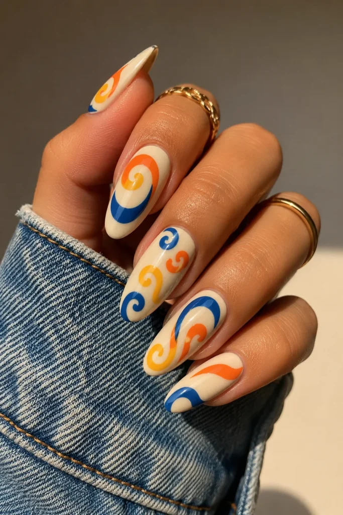 Retro swirl funky nails in bold multicolor on almond shape