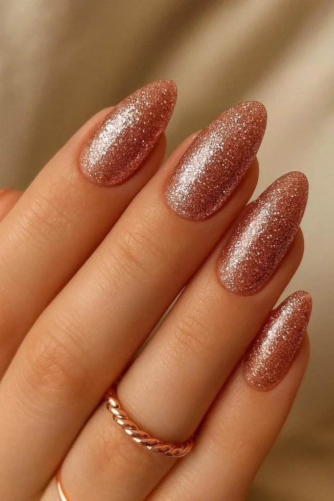 Rose gold glitter nails for romantic homecoming manicure