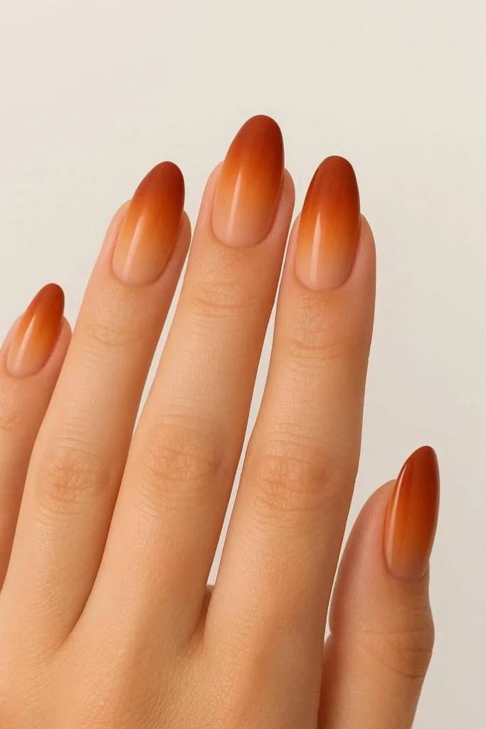 Rust orange ombre gradient nails for autumn