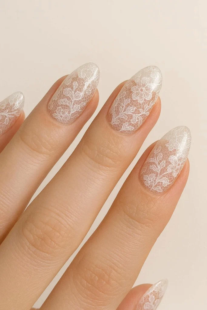 Ethereal sheer lace nail art on a transparent glass-like base