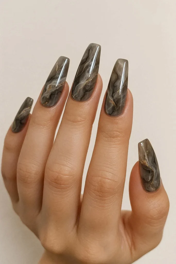 Smoky grey marble nail art with gold veining for fall