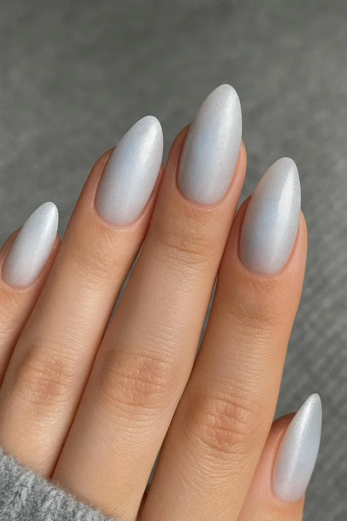 Snowy white silver blue aura nails ethereal winter design