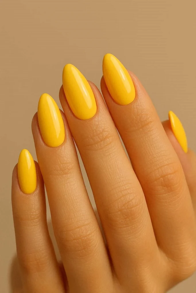 Sunshine yellow almond nails in bright cheerful warm summer shades