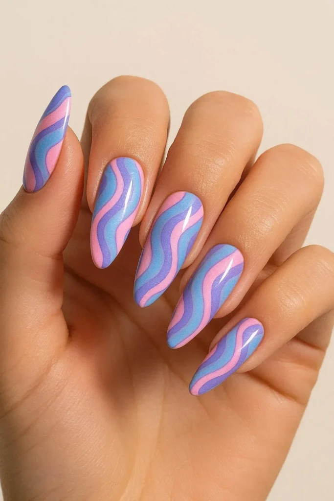 Y2K inspired pucci nails with glossy retro early 2000s swirl art