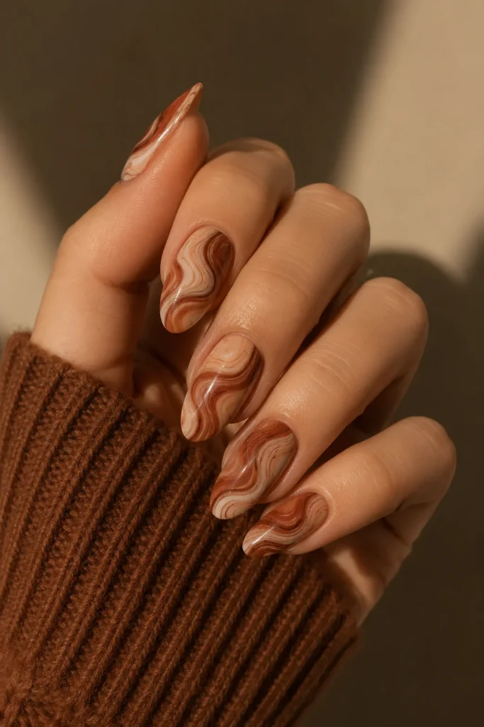 Abstract cinnamon nails free-flowing earthy brown swirls