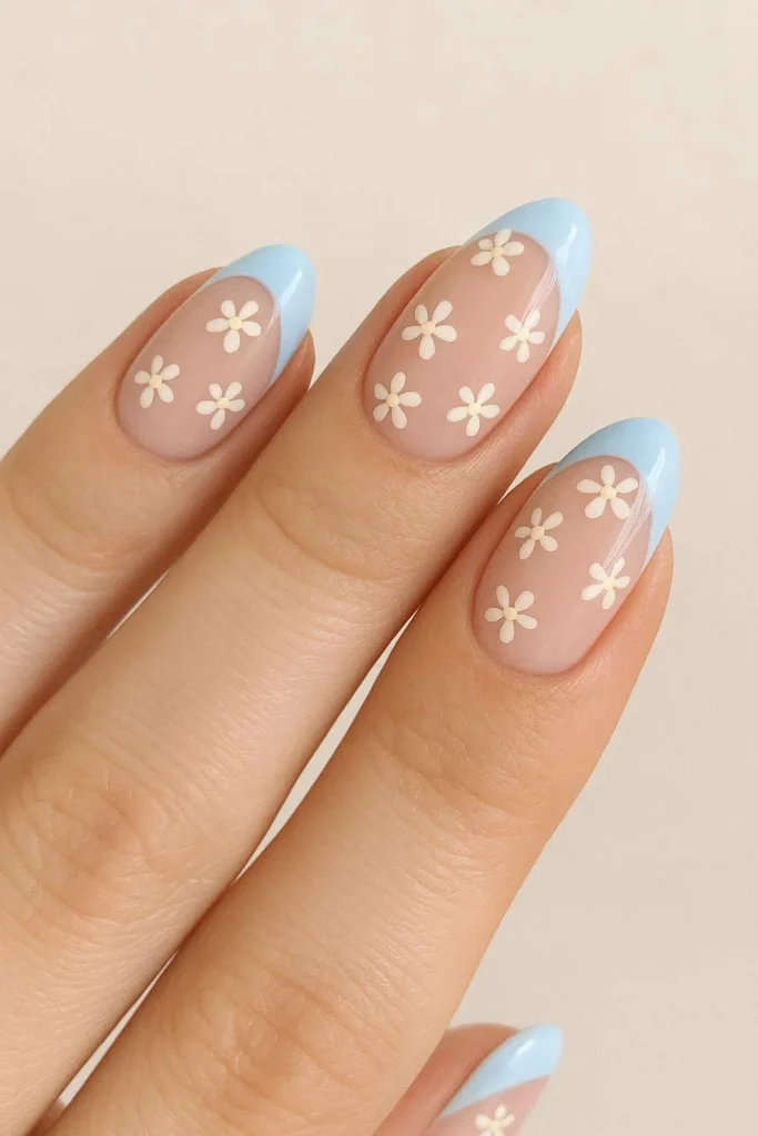 Baby blue French tips with delicate spring floral art