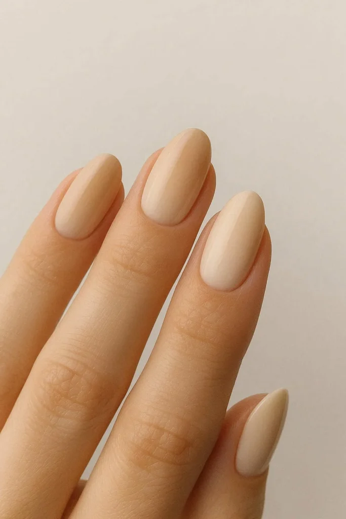 Beige ombre nails with seamless nude to cream gradient