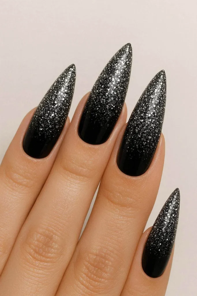 Black glitter ombre nails with dramatic dark sparkle gradient