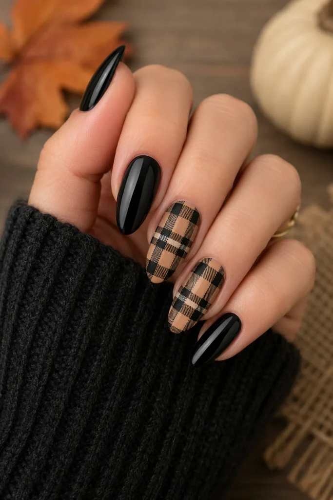 Bold black and tan plaid nails with autumn contrast