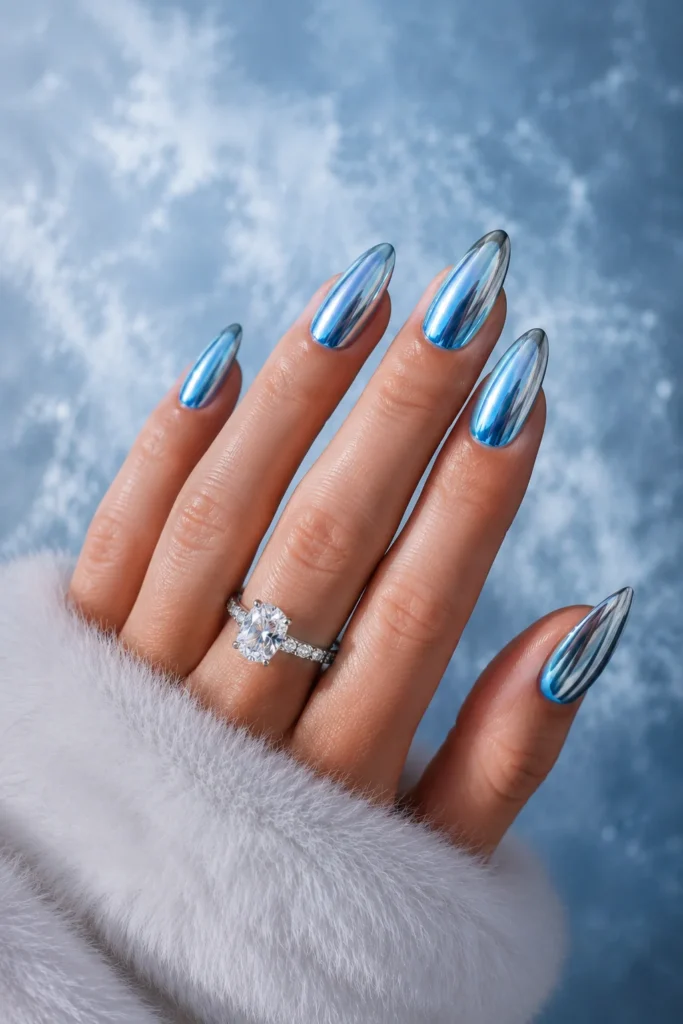 Blue ice chrome almond nails cool winter icy metallic finish