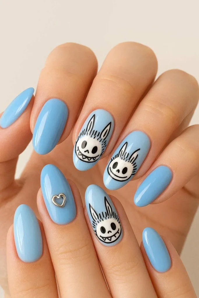 Blue Labubu nails with baby blue glossy cartoon accents 