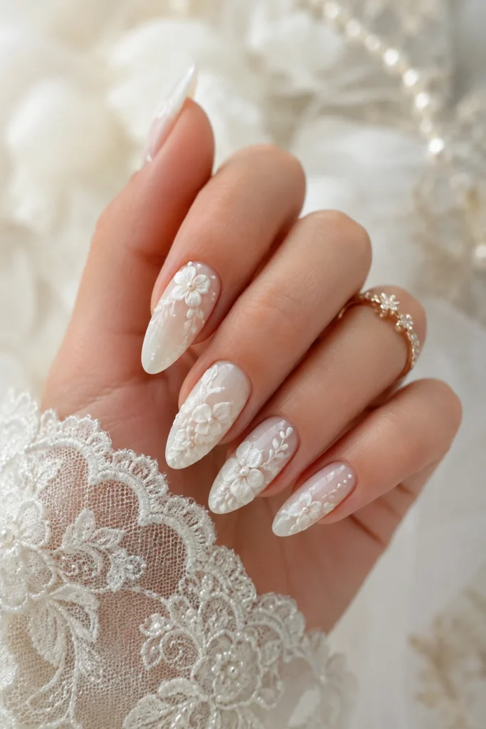 Bridal white flower nails with ivory base and raised sculpted rose art