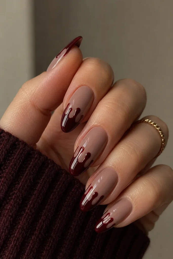 Burgundy blood drip nails with sophisticated gothic look 