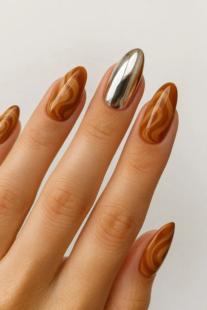 Caramel chrome accent nails reflective fall design