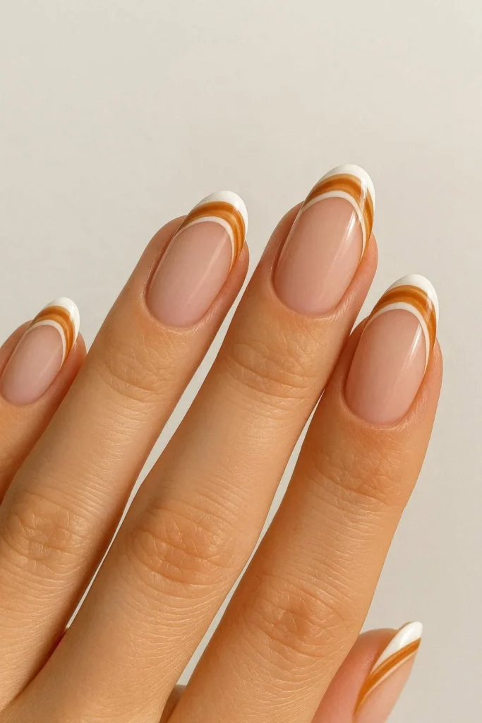 Caramel swirl French tip nails autumn manicure
