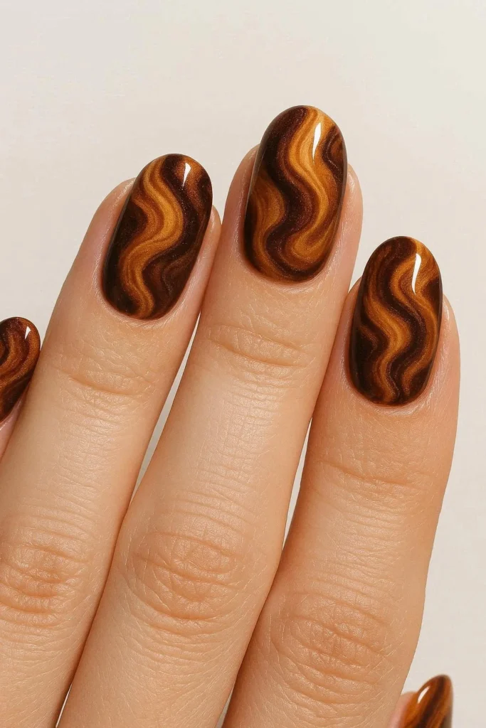 Caramel and mocha marble fall nail design