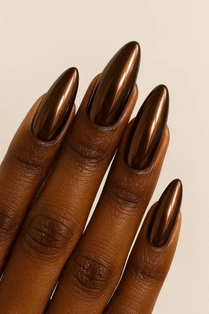 Chocolate brown chrome almond winter nail ideas for black women