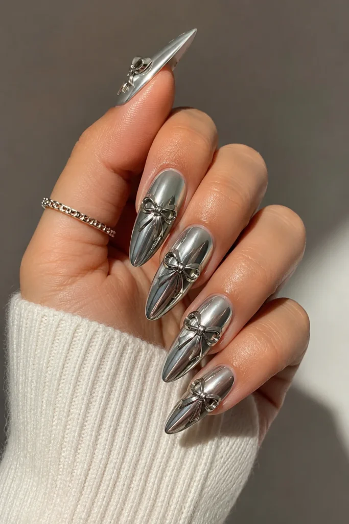 Chrome finish nails with delicate bow art design 