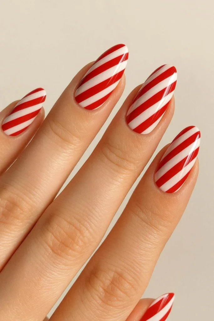 Classic red and white candy cane stripe nail design
