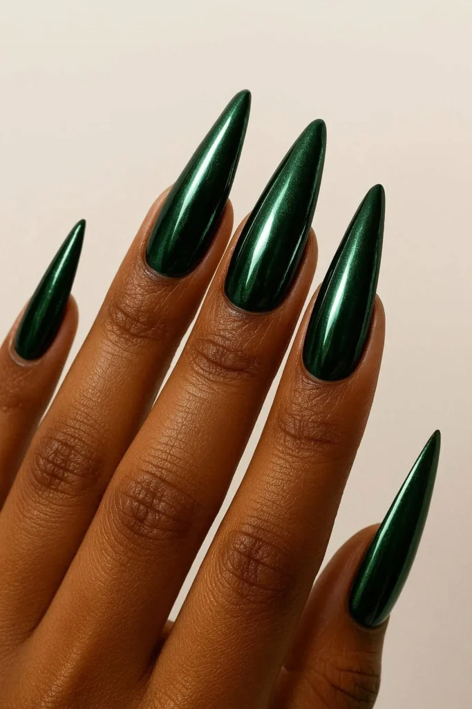  Dark hunter green chrome stiletto nails deep skin tones 