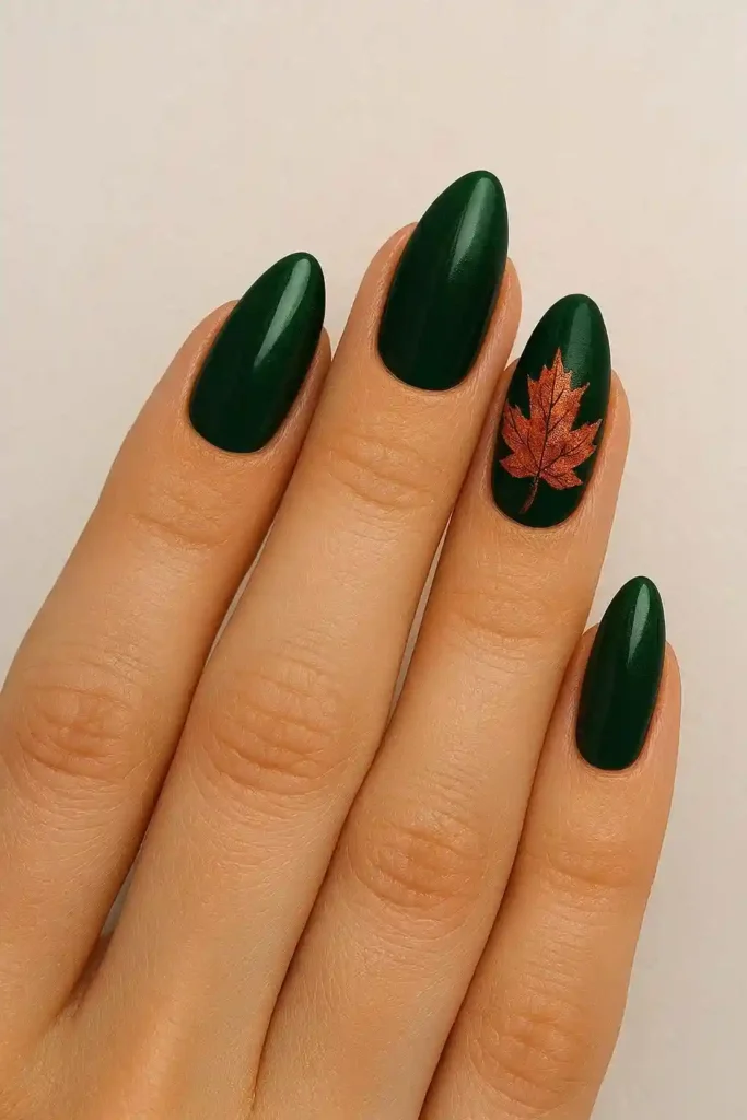 Deep forest green nails with rust gold maple leaf art