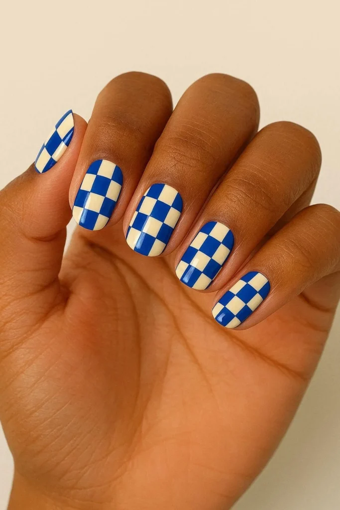 Retro funky checkerboard nail design in bold color combos