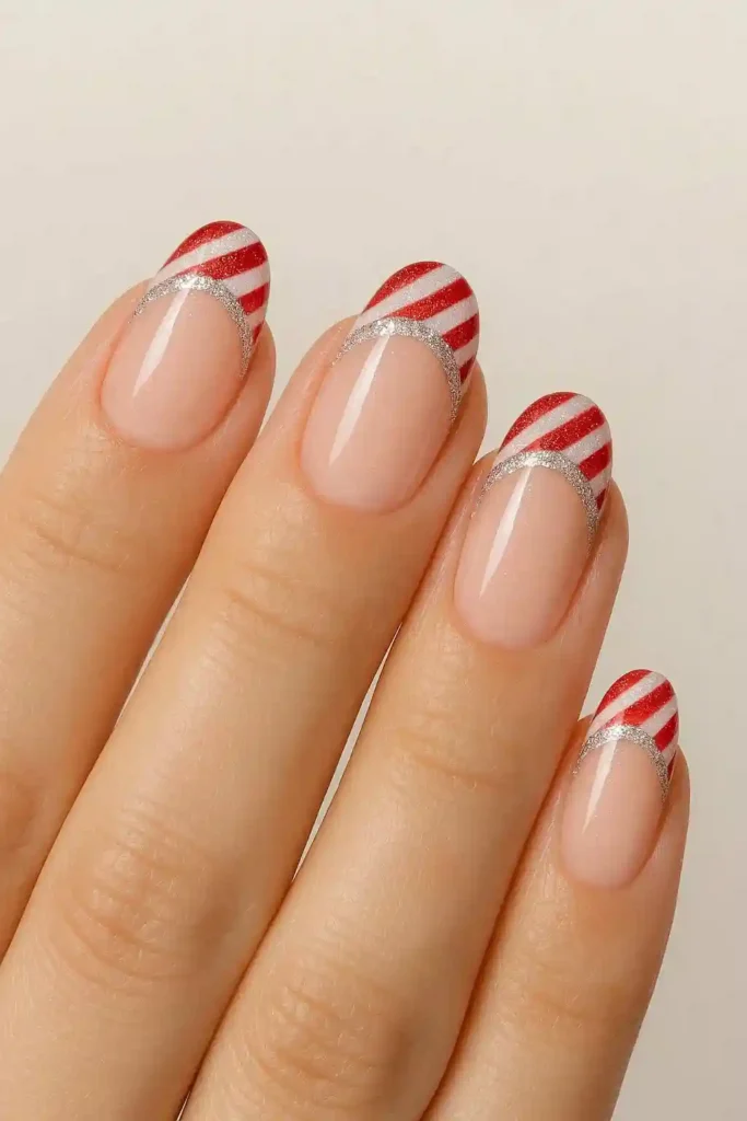 Glitter candy cane French nails with silver sparkle accents