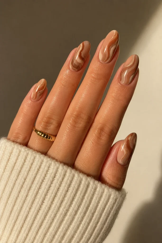 Glossy cinnamon latte nail design with high shine finish