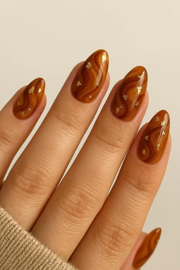 Gold foil caramel swirl nails luxe autumn design