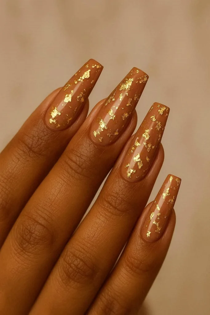  Warm nude coffin nails with gold foil on deep skin