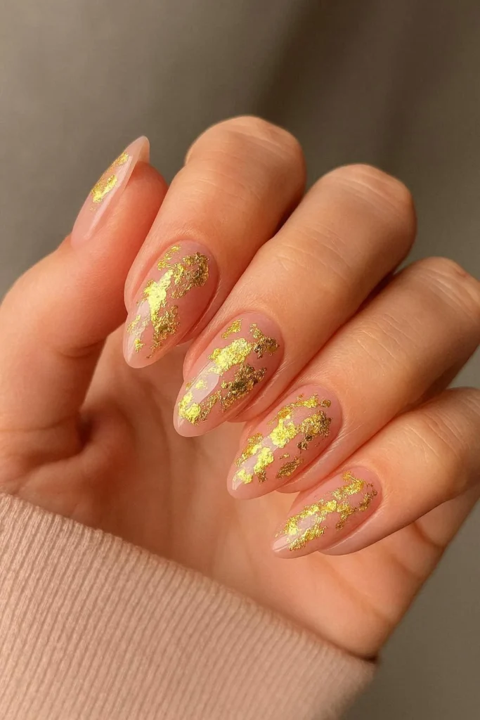 Gold foil pink acrylic nails with crushed metallic luxury detail