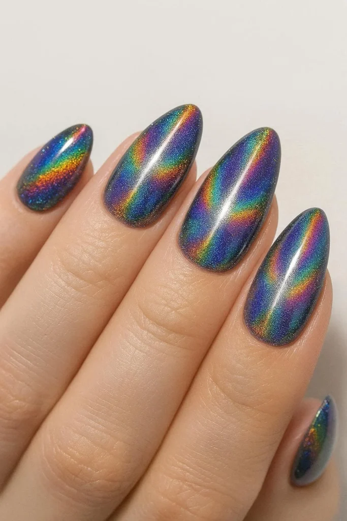 Holographic cat eye nails with rainbow prismatic shimmer on Almond shape