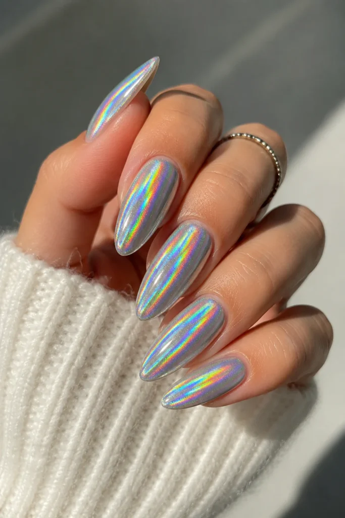 Holographic almond chrome nails rainbow reflective shifting metallic finish