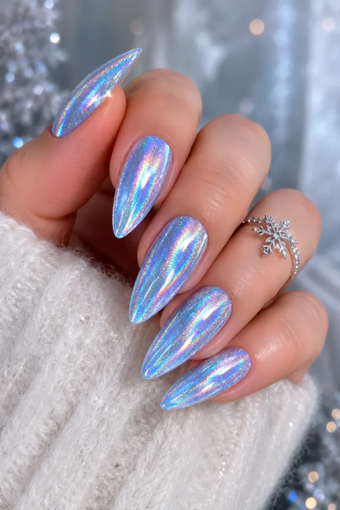 Holographic iridescent blue nails with a reflective shimmering finish