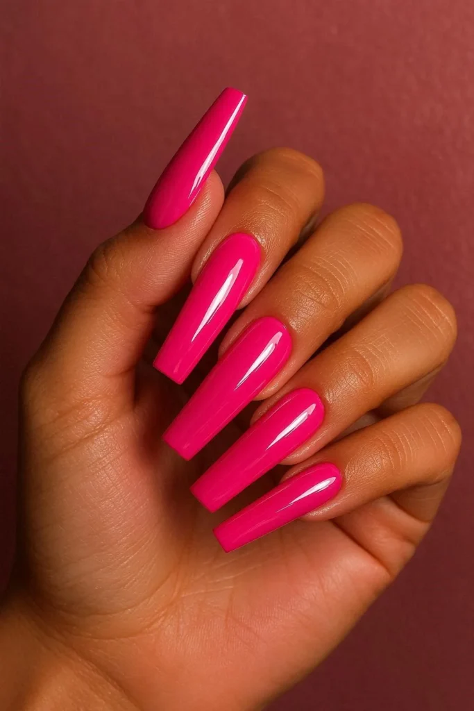  Hot pink coffin acrylic nails with bold high-gloss finish