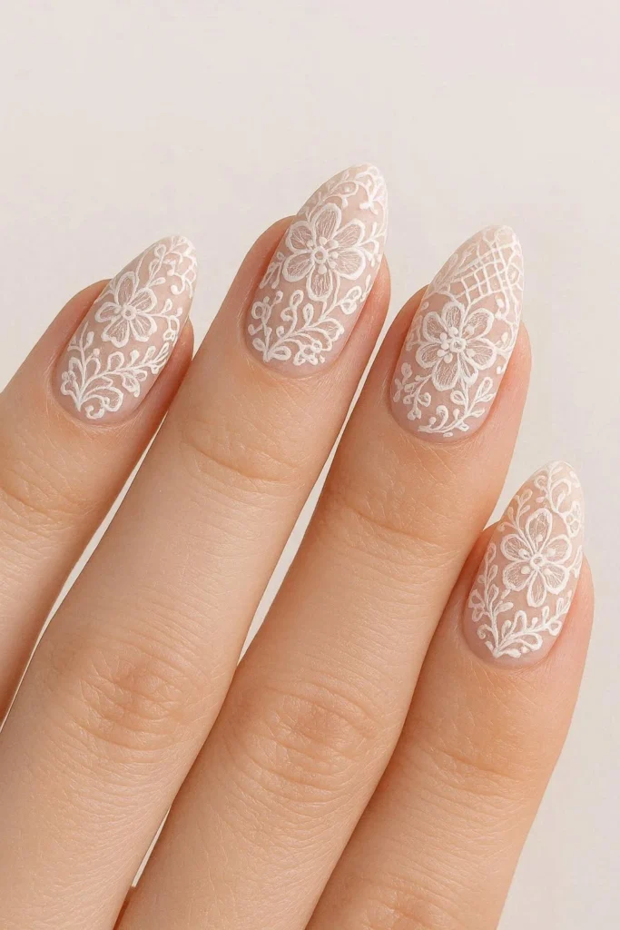 Lace inspired blush pink bridal nail art design