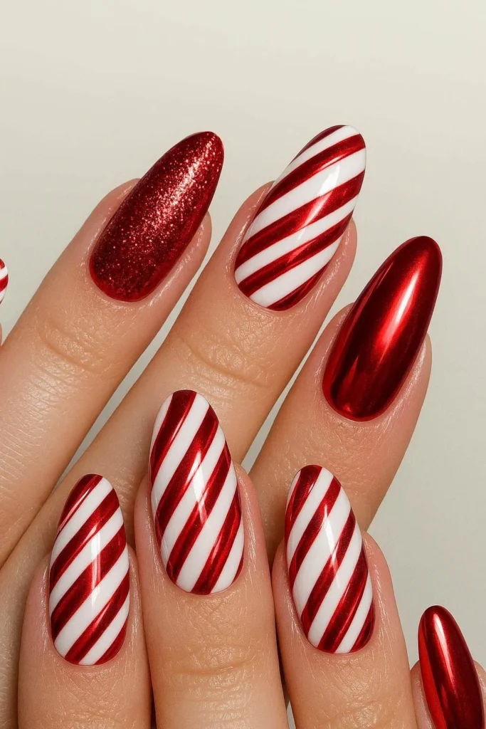 Luxurious candy cane nails with glitter chrome and holiday art