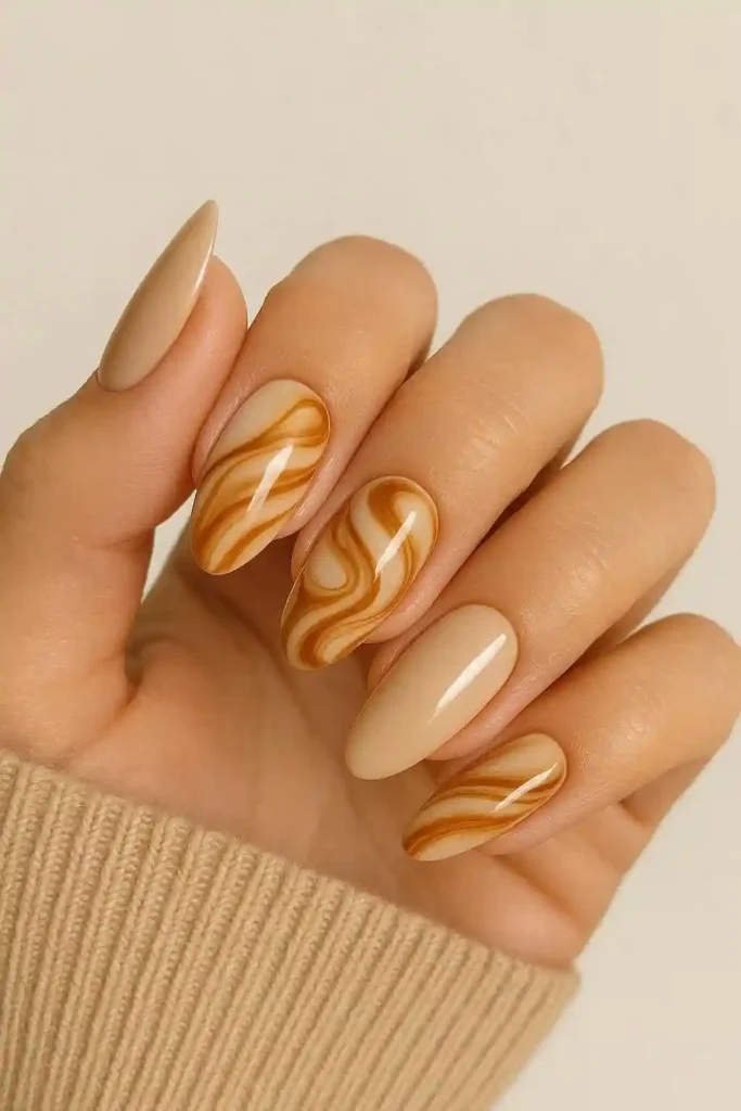 Luxe caramel latte nails elegant autumn swirl design