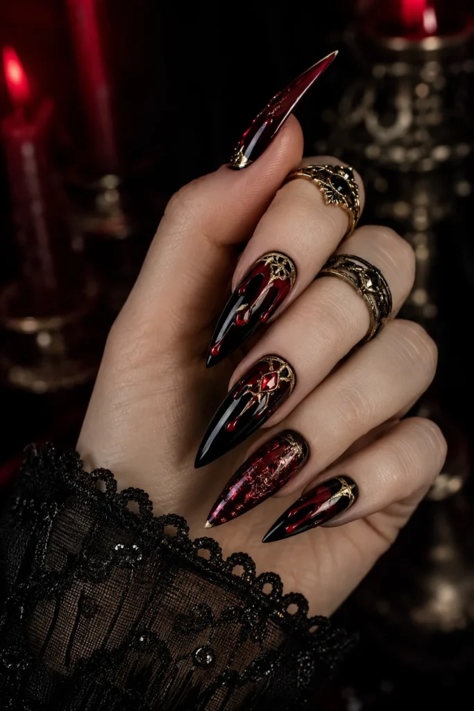 Luxe gothic blood drip nails with black red metallic accents 