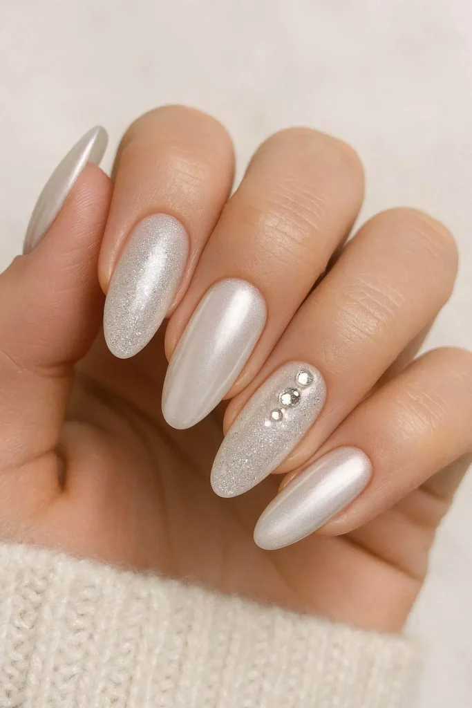 Luxe winter bridal nails pearl chrome glitter December wedding design