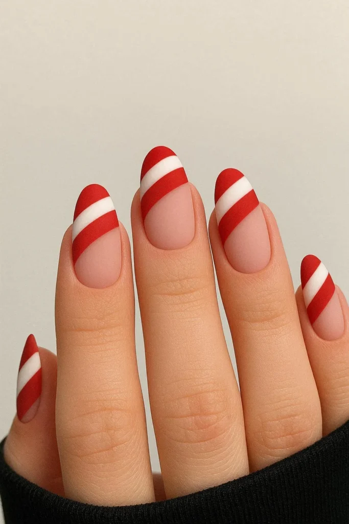 Matte candy cane French tip nails modern festive red white finish