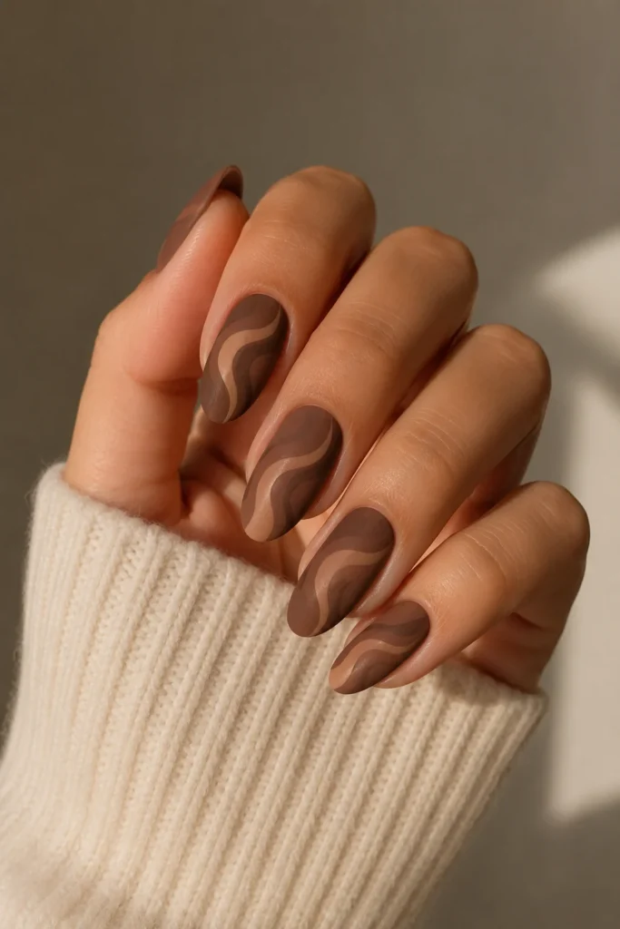 Matte cinnamon nails velvety brown swirl nail design