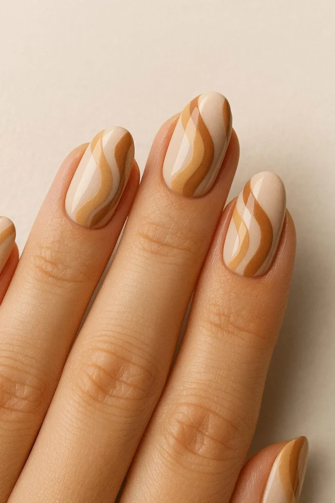 Neutral autumn swirl nails beige tan caramel tones