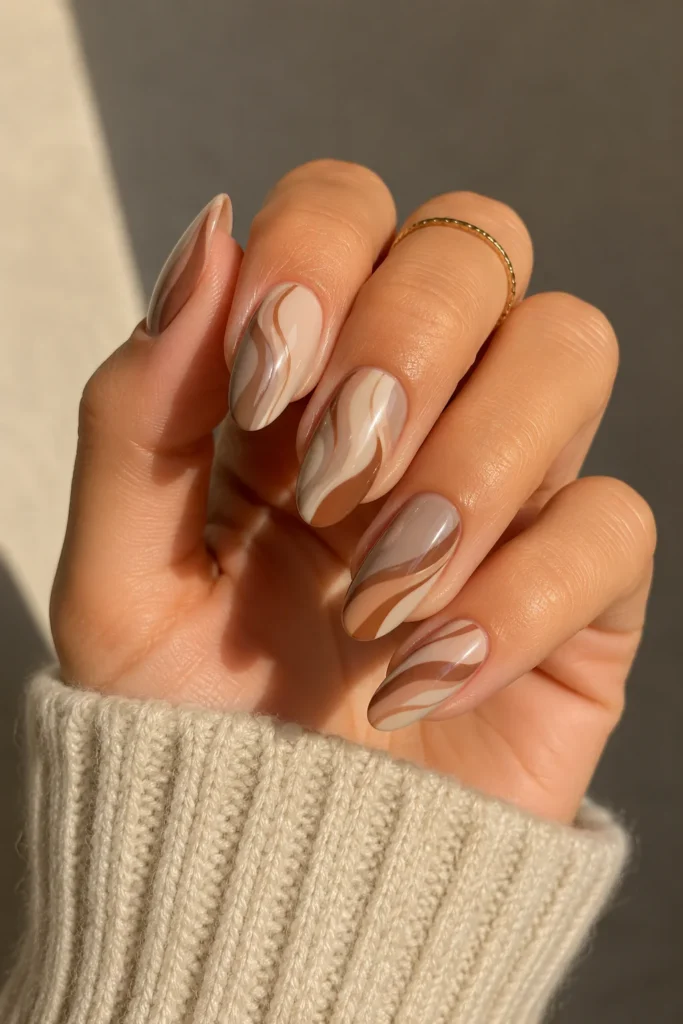 Neutral fall swirl nails taupe beige cinnamon tones
