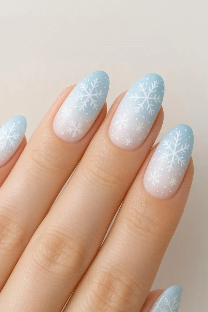 Ombre snowflake nails white to blue winter gradient